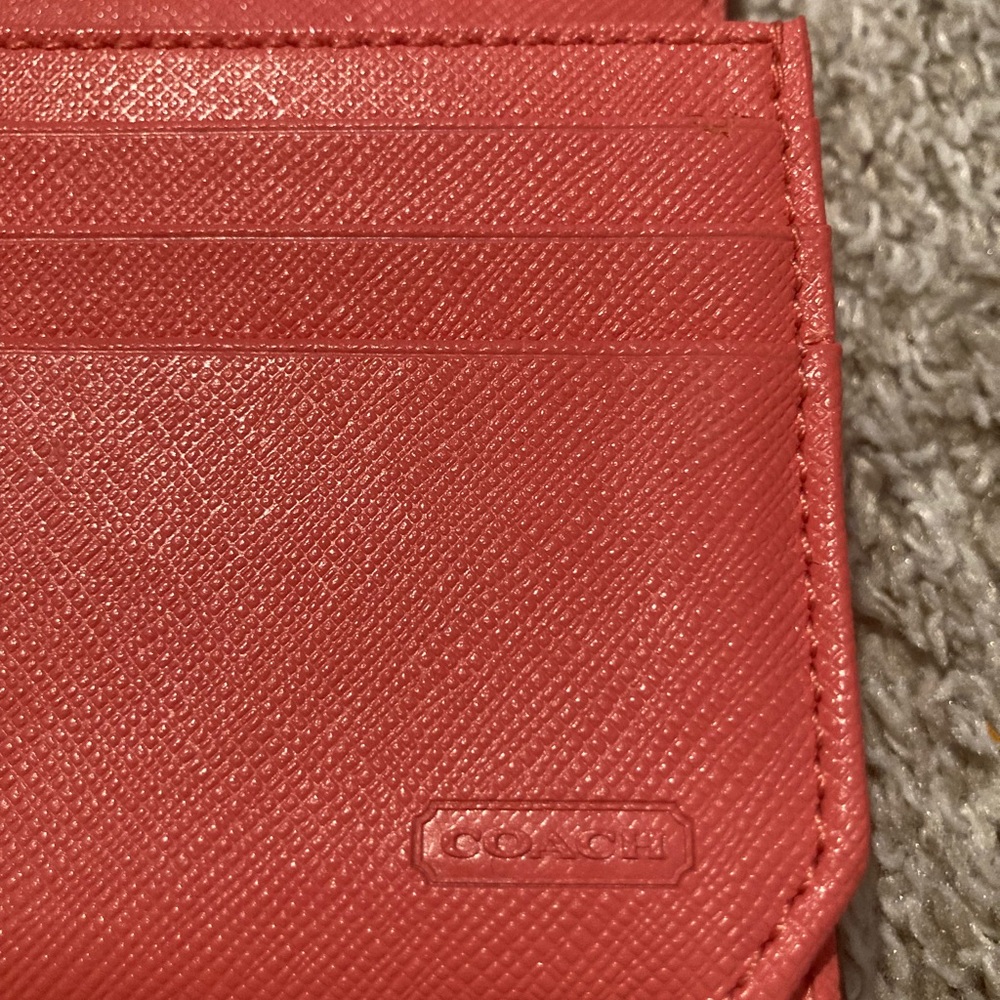 Burnt orange Coach wallet